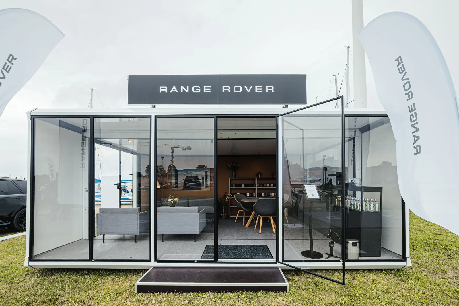 The glazed front of the module with the Range Rover sign over the door